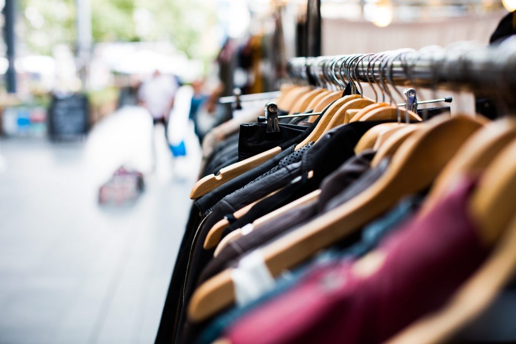 Fashion products on a clothing rack – shoppable stories for ecommerce